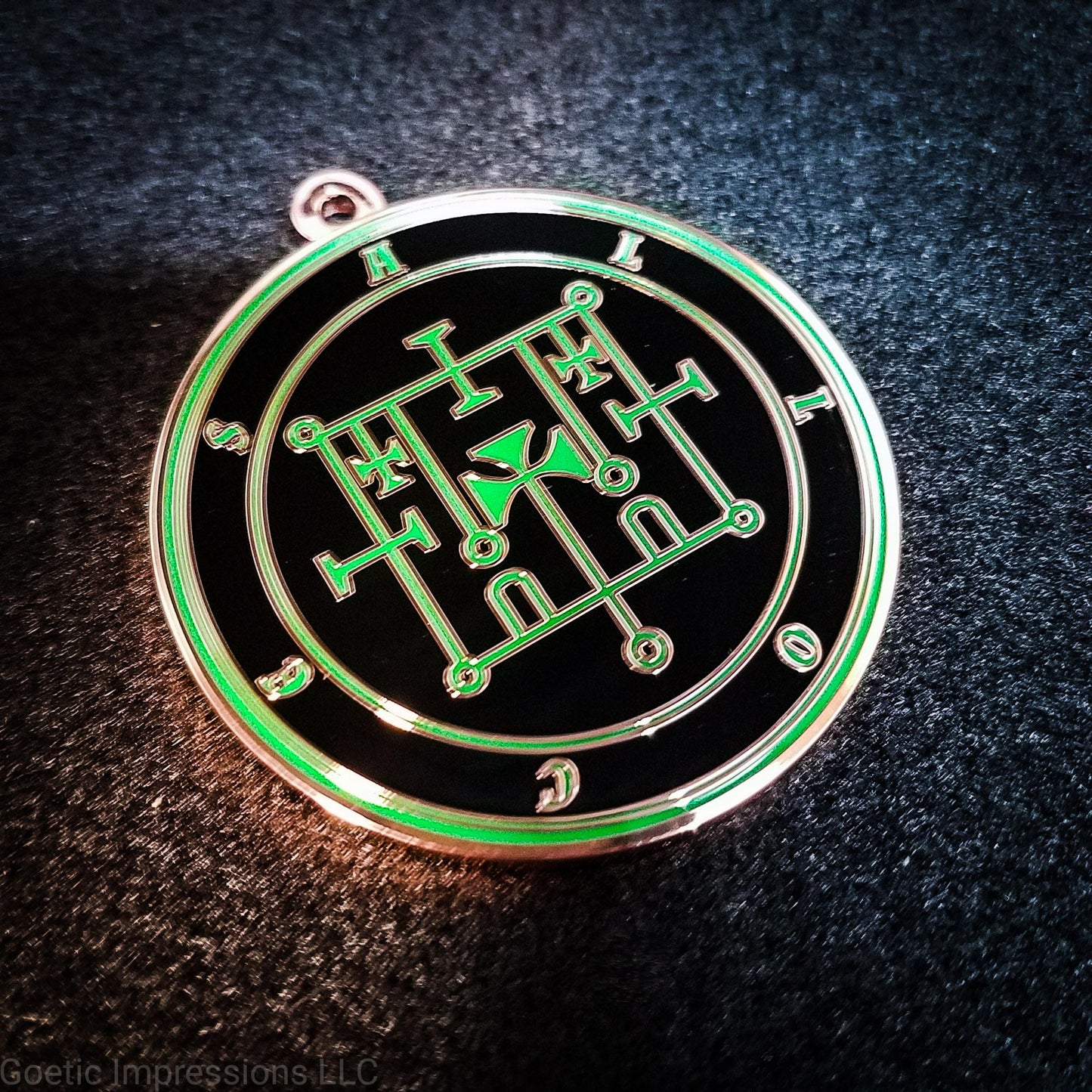 Alloces sigil medallion.