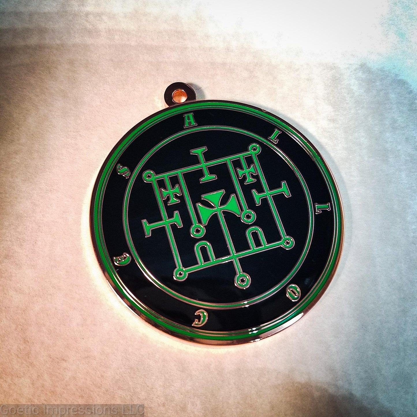 Alloces sigil medallion.