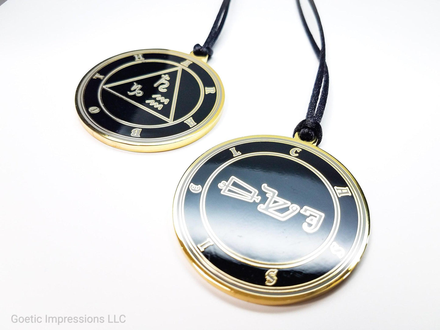 Heptameron Inspired Archangel Pendant featuring the seal and sigils of Archangel Cassiel. Featuring on the reverse side of the talsiman, the Heaven Araboth and astrological symbols of Saturn, Capricorn and Aquarius based on Cornelius Agrippa