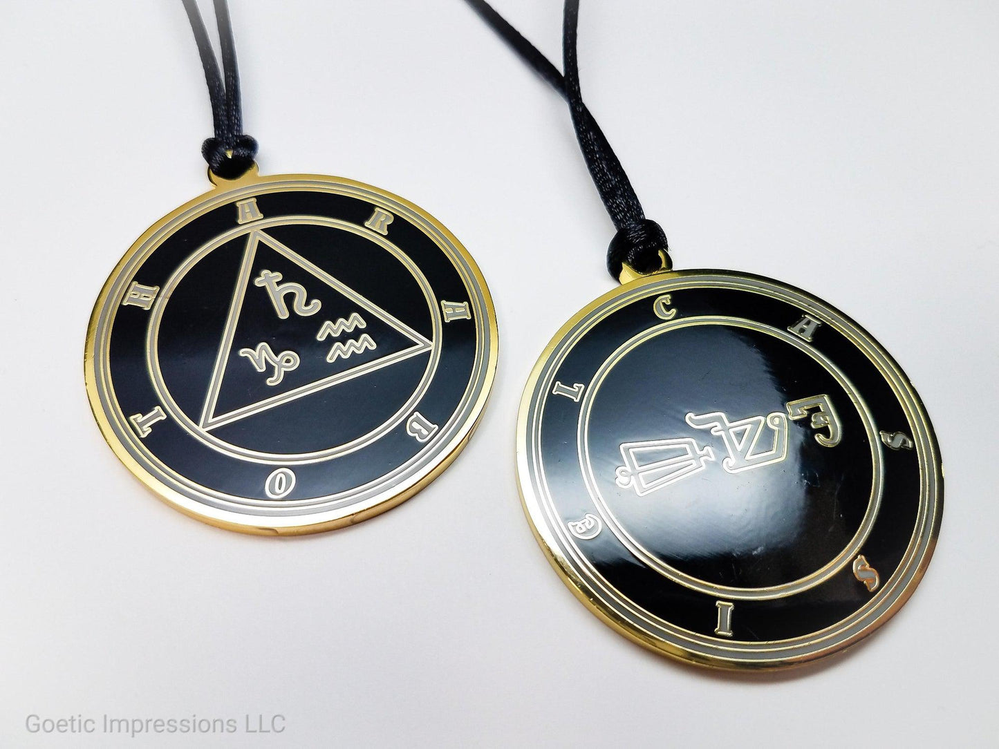 Heptameron Inspired Archangel Pendant featuring the seal and sigils of Archangel Cassiel. Featuring on the reverse side of the talsiman, the Heaven Araboth and astrological symbols of Saturn, Capricorn and Aquarius based on Cornelius Agrippa