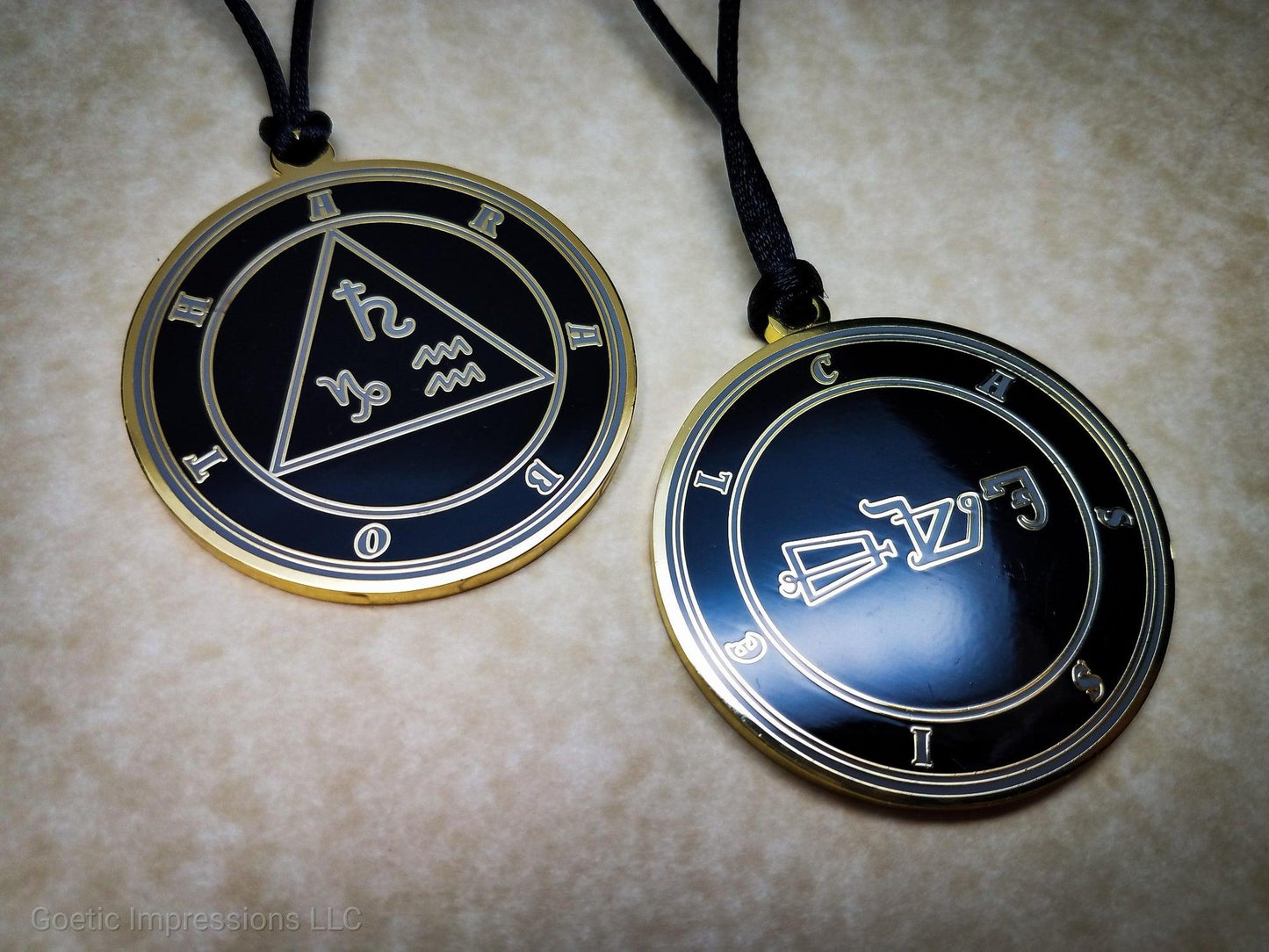 Heptameron Inspired Archangel Pendant featuring the seal and sigils of Archangel Cassiel. Featuring on the reverse side of the talsiman, the Heaven Araboth and astrological symbols of Saturn, Capricorn and Aquarius based on Cornelius Agrippa