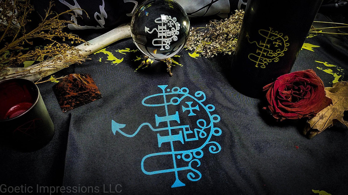 Asmodeus altar setup featuring candle, crystal ball and altar cloth