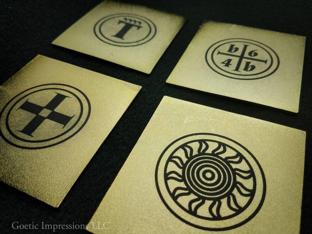 Back of Enochian watchtower tablets featuring watchtower symbols