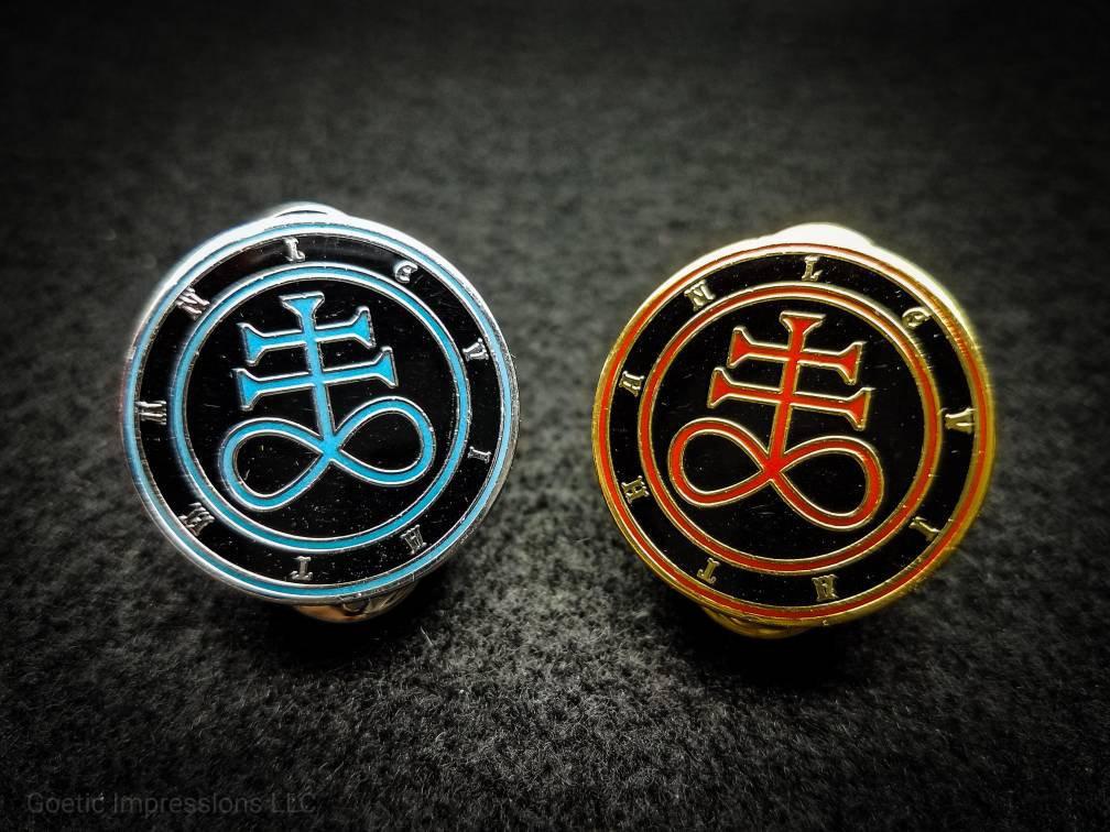 Red and Blue Leviathan sigil enamel pins.