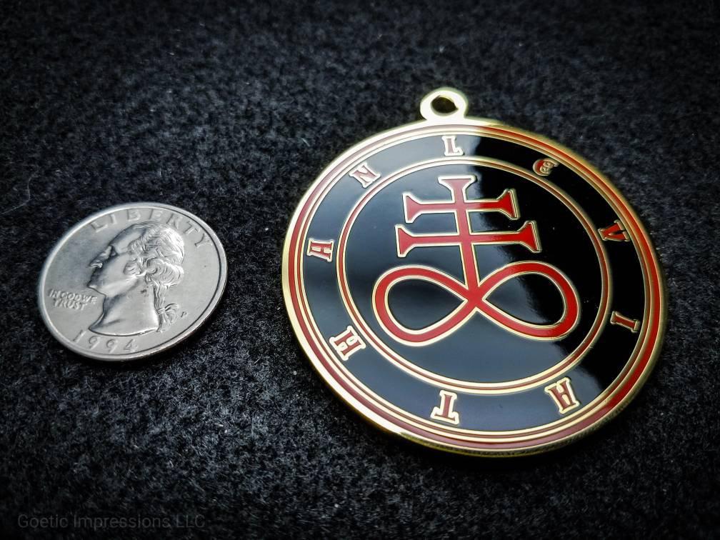 Black and red Leviathan sigil medallion with gold plating.