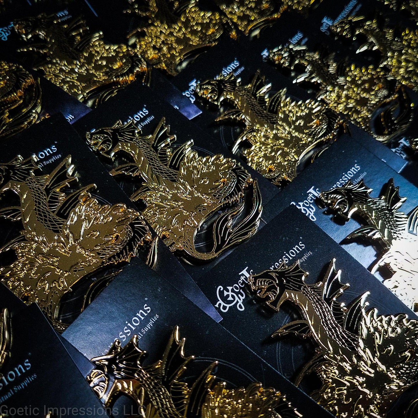 A series of Leviathan pins waiting to be shipped.