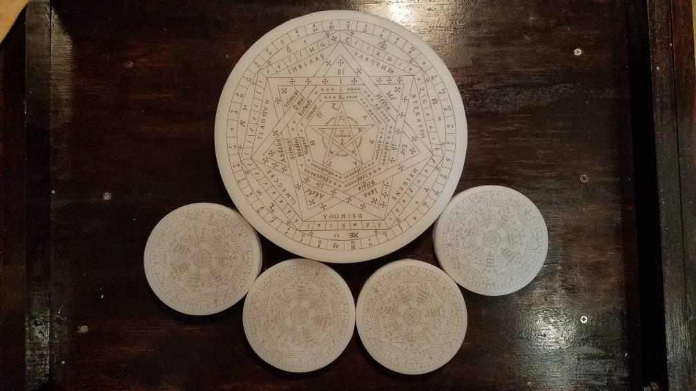 Full set of wax Sigillum Dei Aemeth's featuring four, four inch and one nine inch disks.
