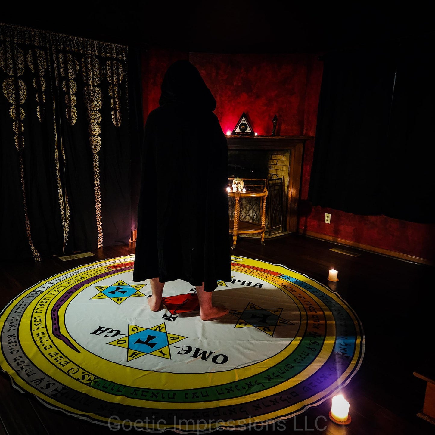 A magician standing in the center of a 9ft magickal circle of solomon with candles lit on each corner. The magician is looking into the triangle of solomon.