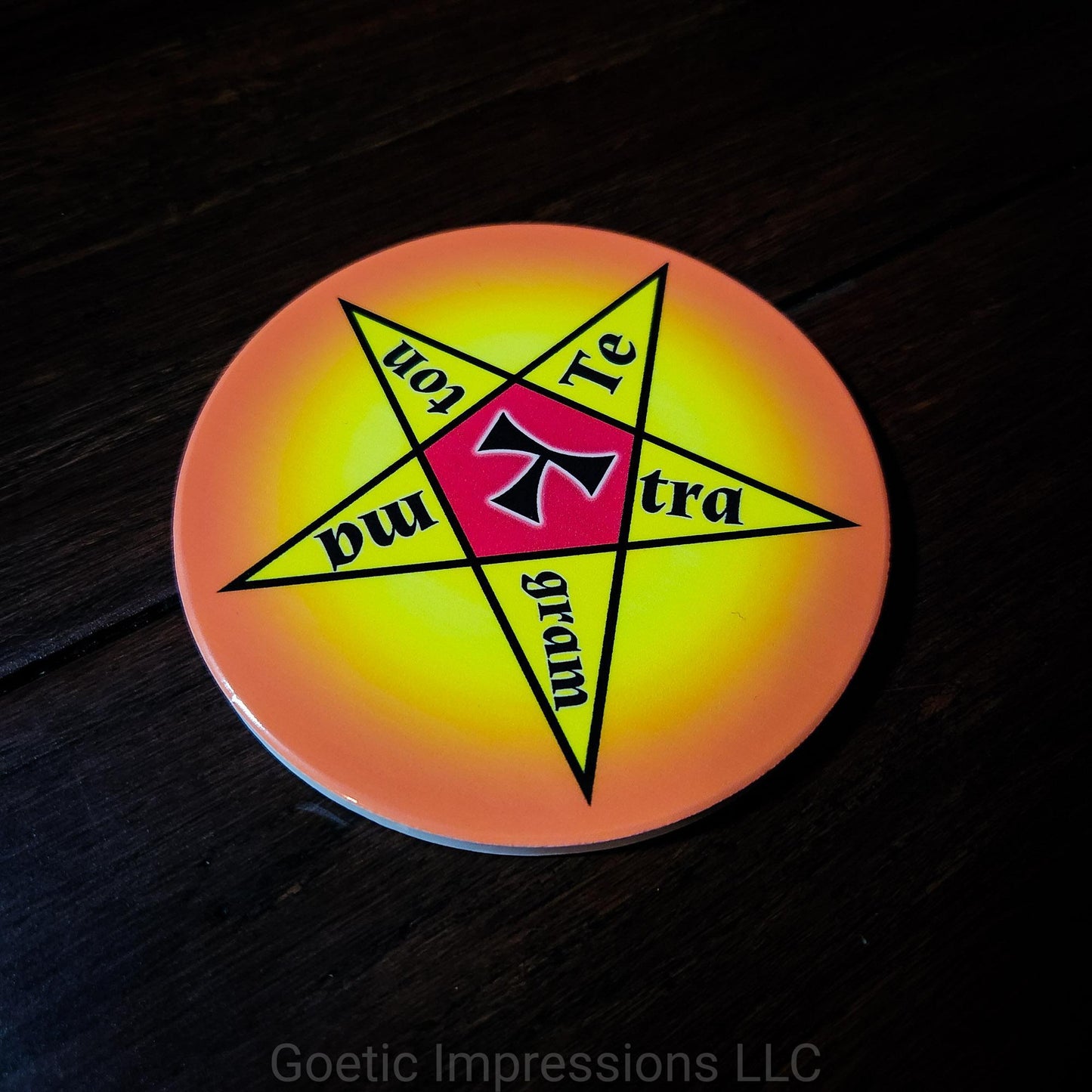 A ceramic disk for candle placement. In the center is a star with Tetragrammaton in each point of the star.