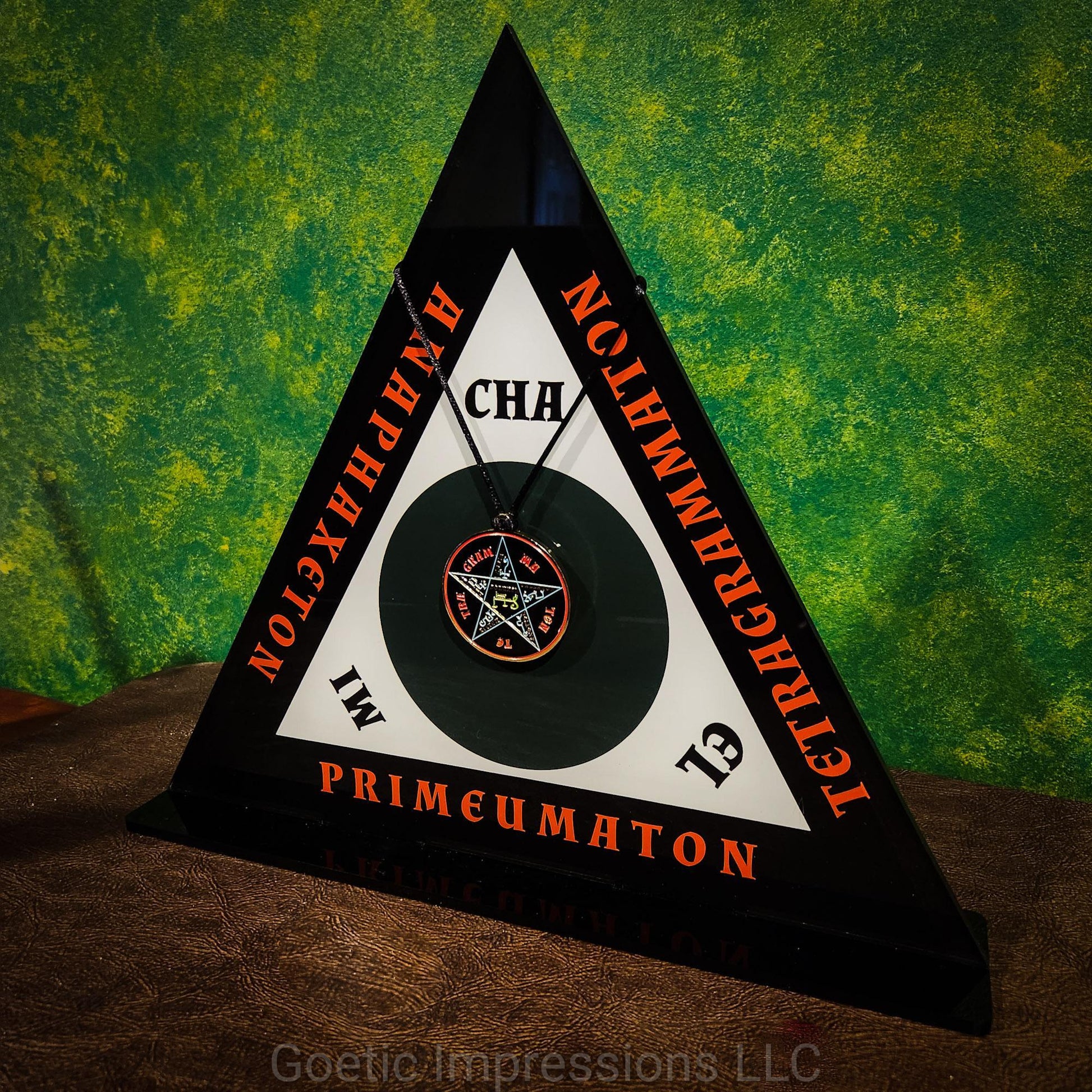 Magickal Triangle of Solomon with a Goetic medallion hanging in the center.