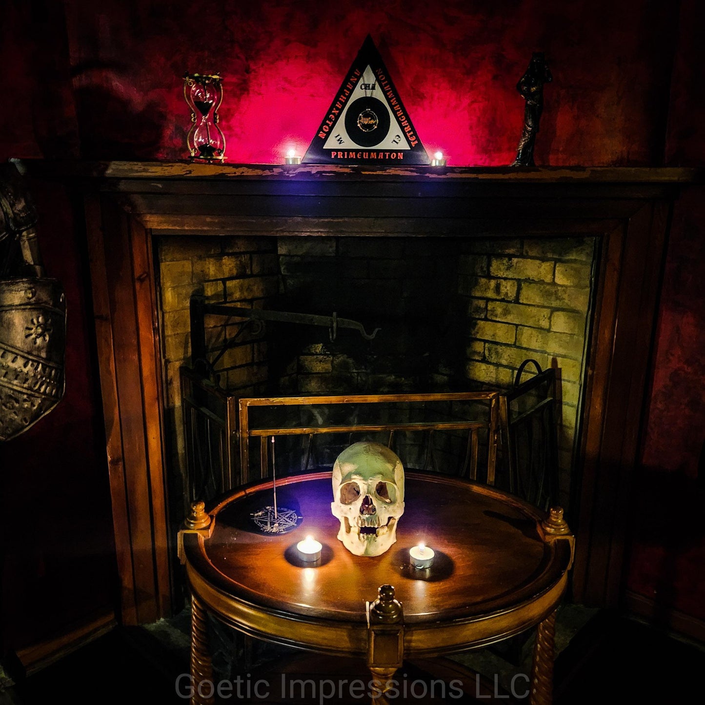 The Magickal Triangle of Solomon with a Skull lit by candles.