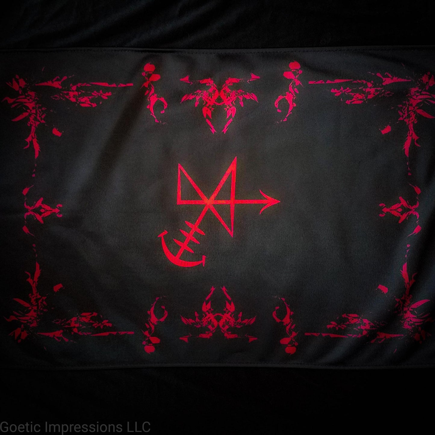 A black and red Abaddon sigil altar cloth.
