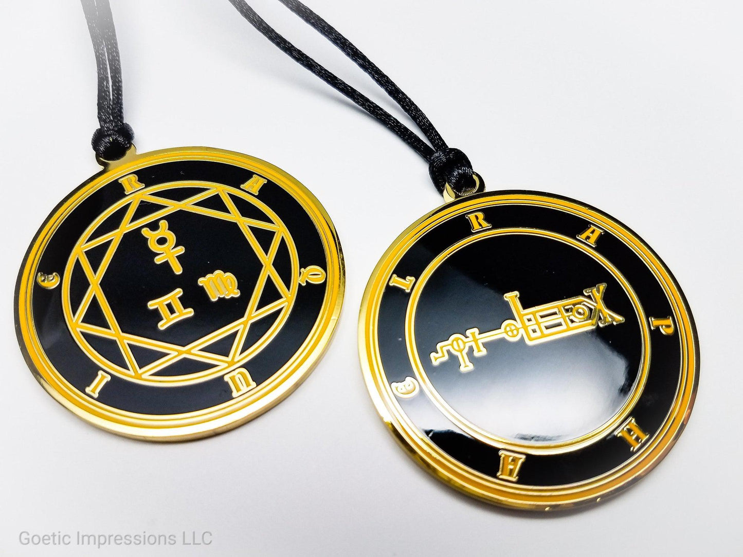 Heptameron Inspired Archangel Pendant featuring the seal and sigils of Archangel Raphael.  Featuring on the reverse side of the talsiman, the Heaven Raquie and astrological symbols of Mercury, Gemini and Virgo based on Cornelius Agrippa