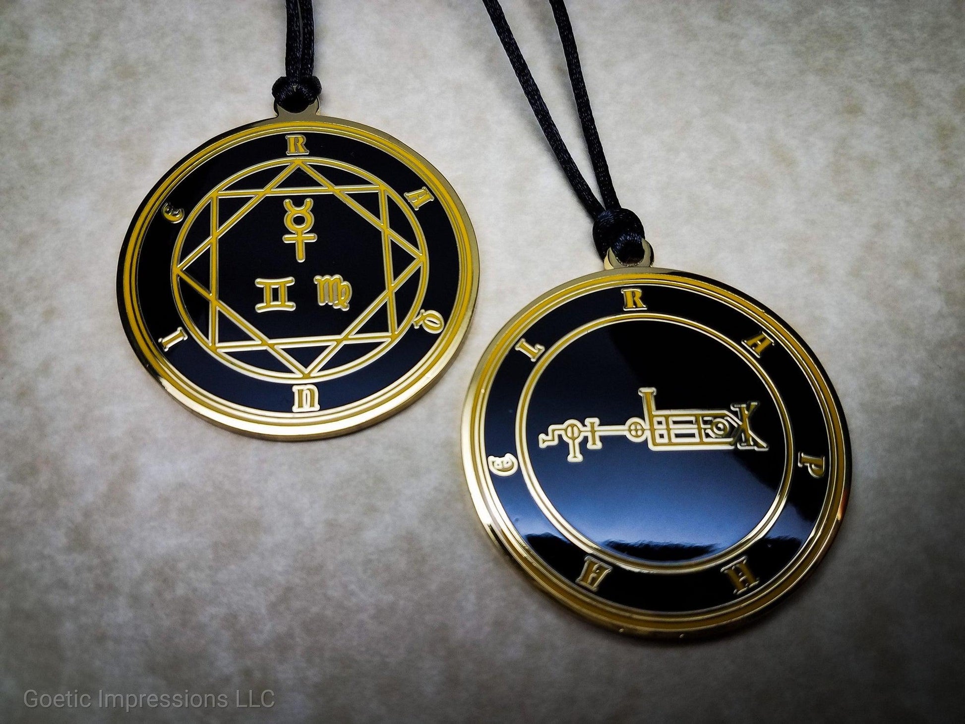 Heptameron Inspired Archangel Pendant featuring the seal and sigils of Archangel Raphael.  Featuring on the reverse side of the talsiman, the Heaven Raquie and astrological symbols of Mercury, Gemini and Virgo based on Cornelius Agrippa