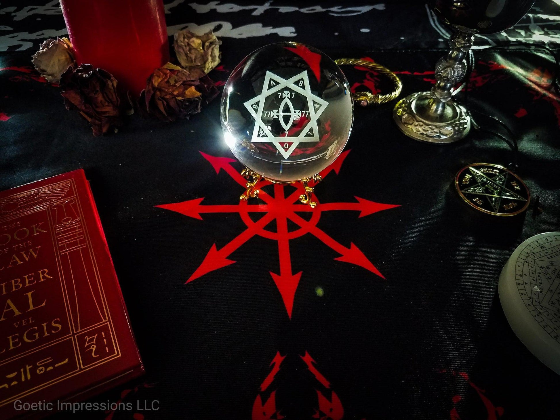 Thelemic altar with a Star of Babalon sigil engraved into the Crystal Ball