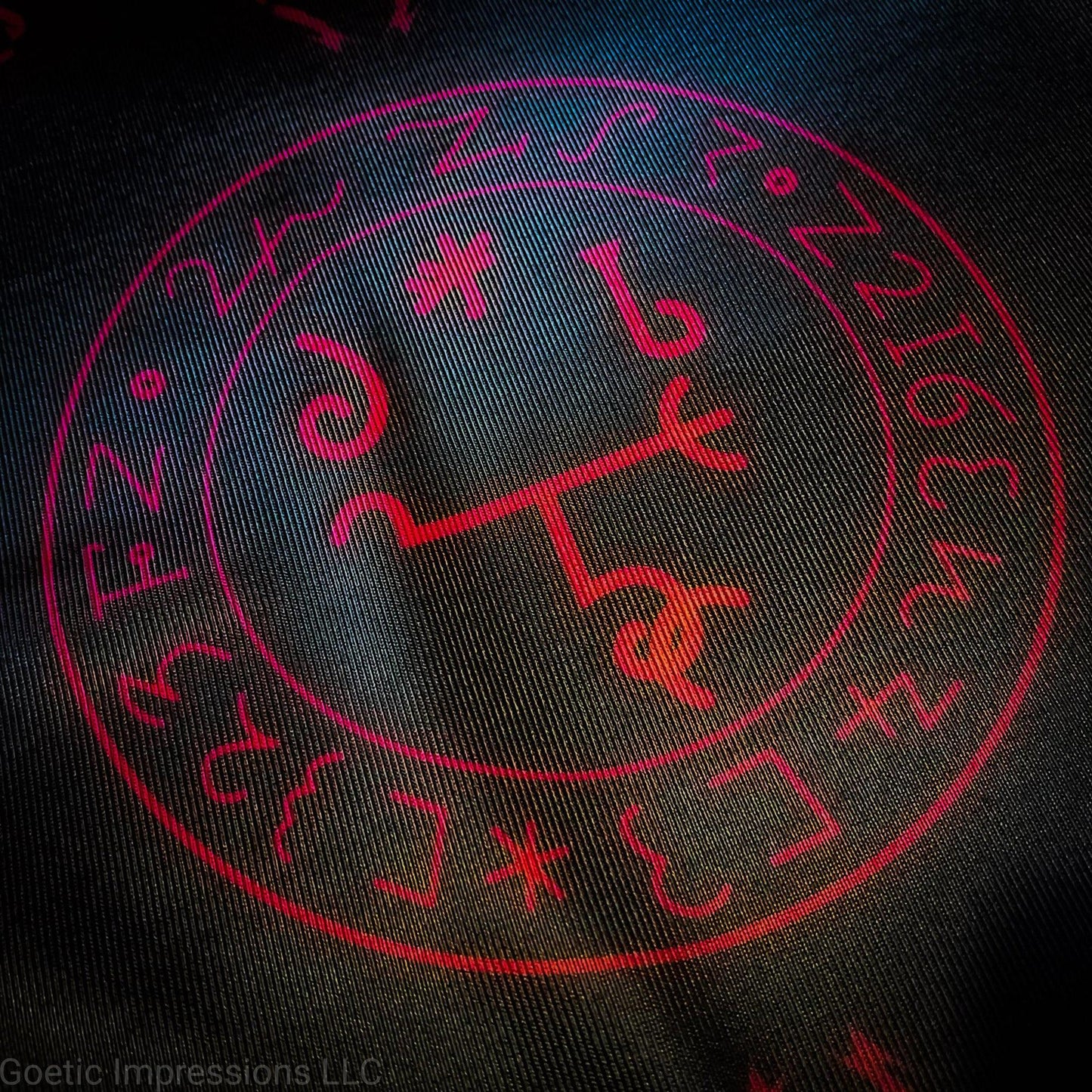 A red and black altar cloth with the sigil of Beelzebub in the center. 