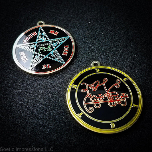 Two medallions featuring the front and back of the Ars Goetia spirit Beleth. The sigil is red with the name and circle surrounding in yellow. The Reverse is the TETRAGRAMMATON. The pentacle is blue with a red circle. Tetragrammaton is in red. The center sigil is green. The seal is plated in gold.
