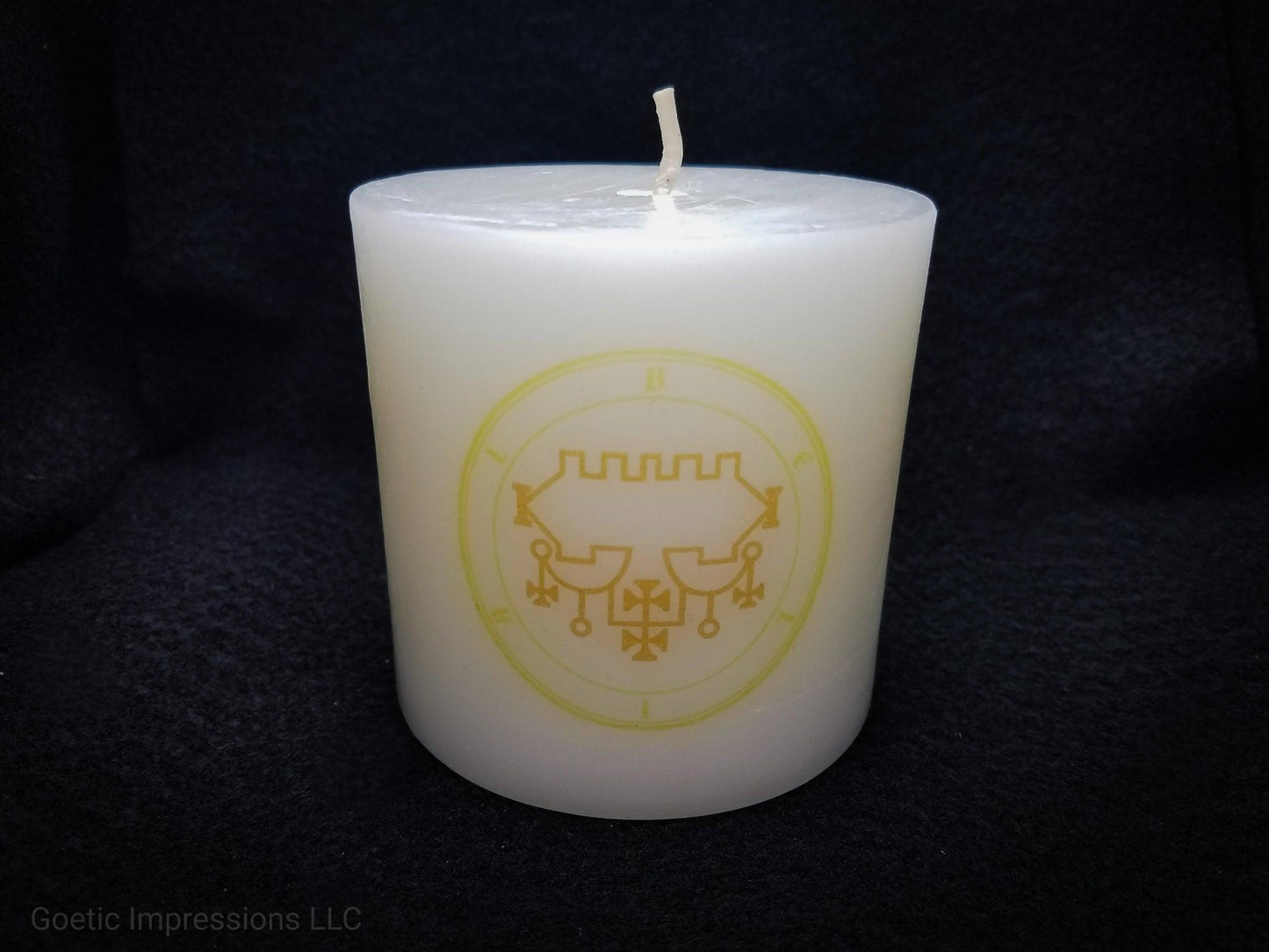 White pillar candle with 2 color Belial sigil seal