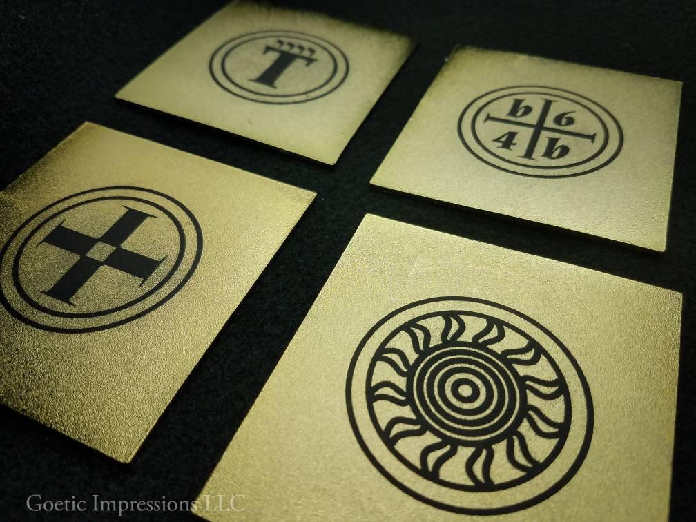 Back of Enochian watchtower  tablets featuring watchtower symbols