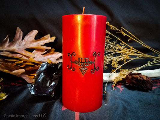 Red pillar candle featuring the sigil of Furfur