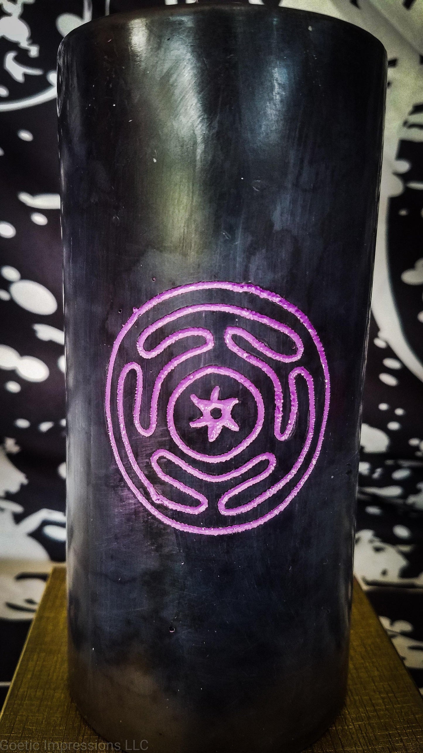 Purple Hekate sigil engraved in a black candle