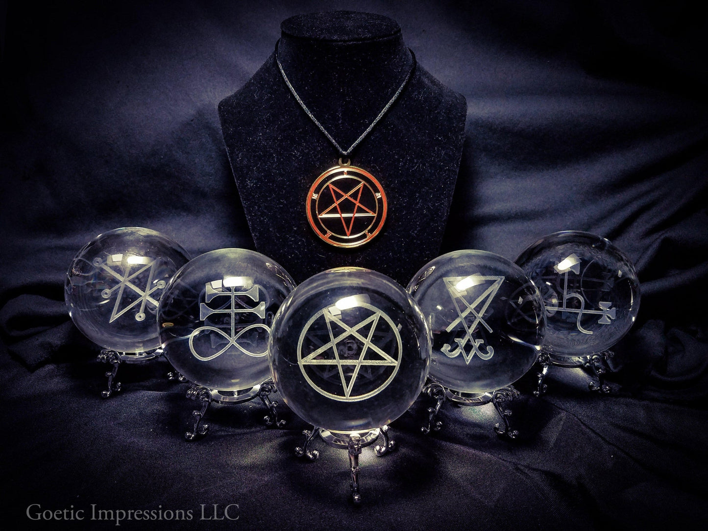 Occult symbols engraved in crystal balls