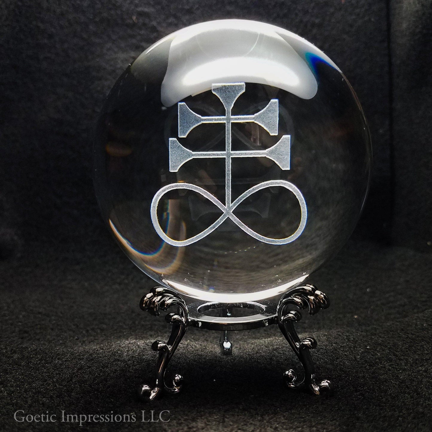 Leviathan sigil engraved in crystal ball with silver base