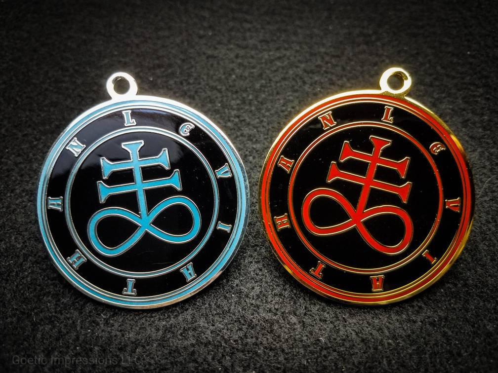 Blue and red Leviathan sigil pendants