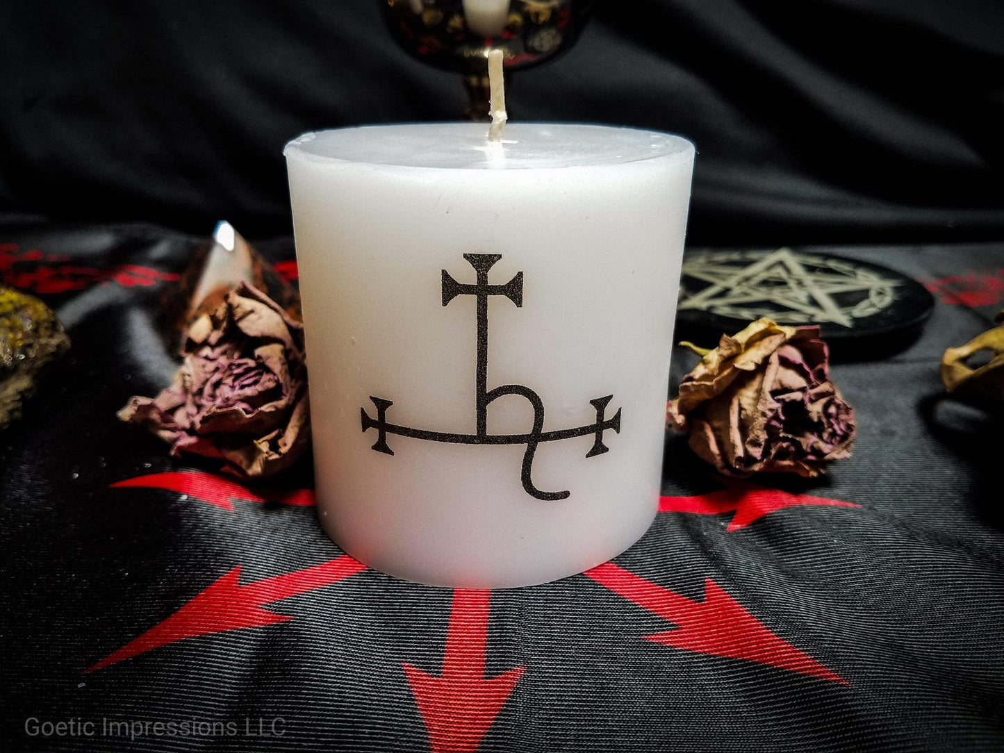 White pillar candle with Lilith sigil