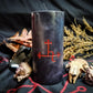 Black pillar candle with red Lilith sigil carved into it