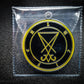 Adept Black and Yellow Lucifer medallion