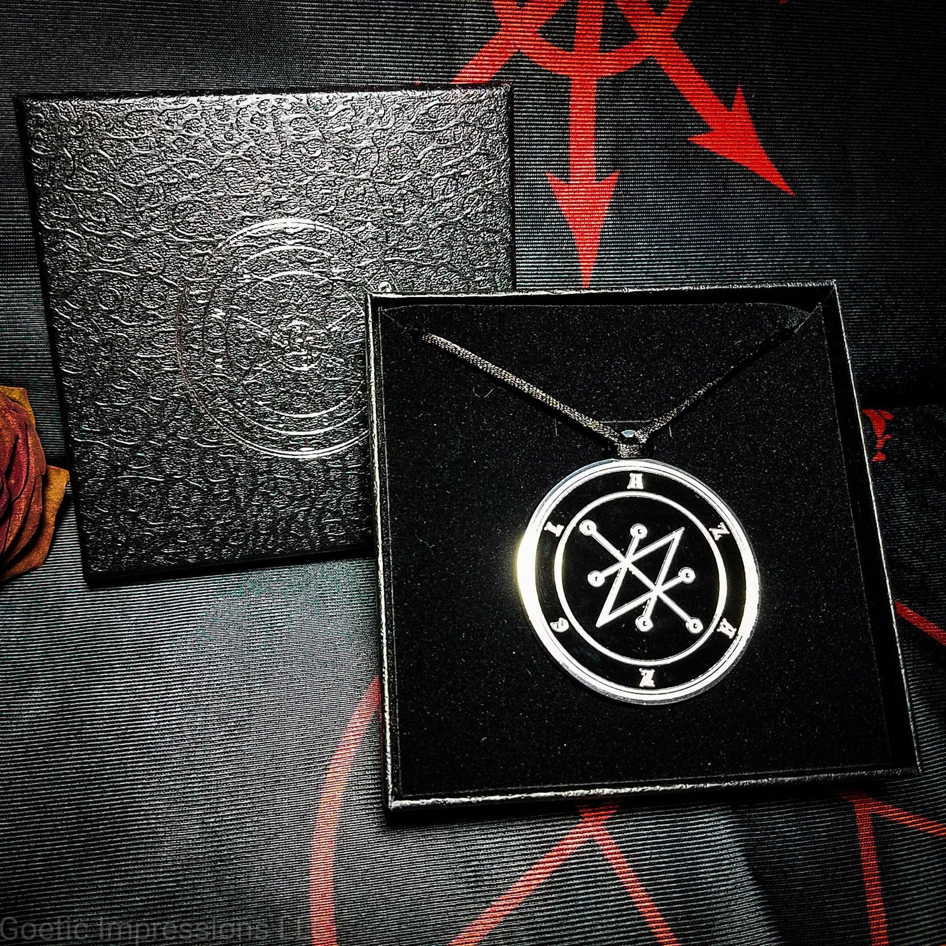 Black and White Azazel sigil medallion with gift box.