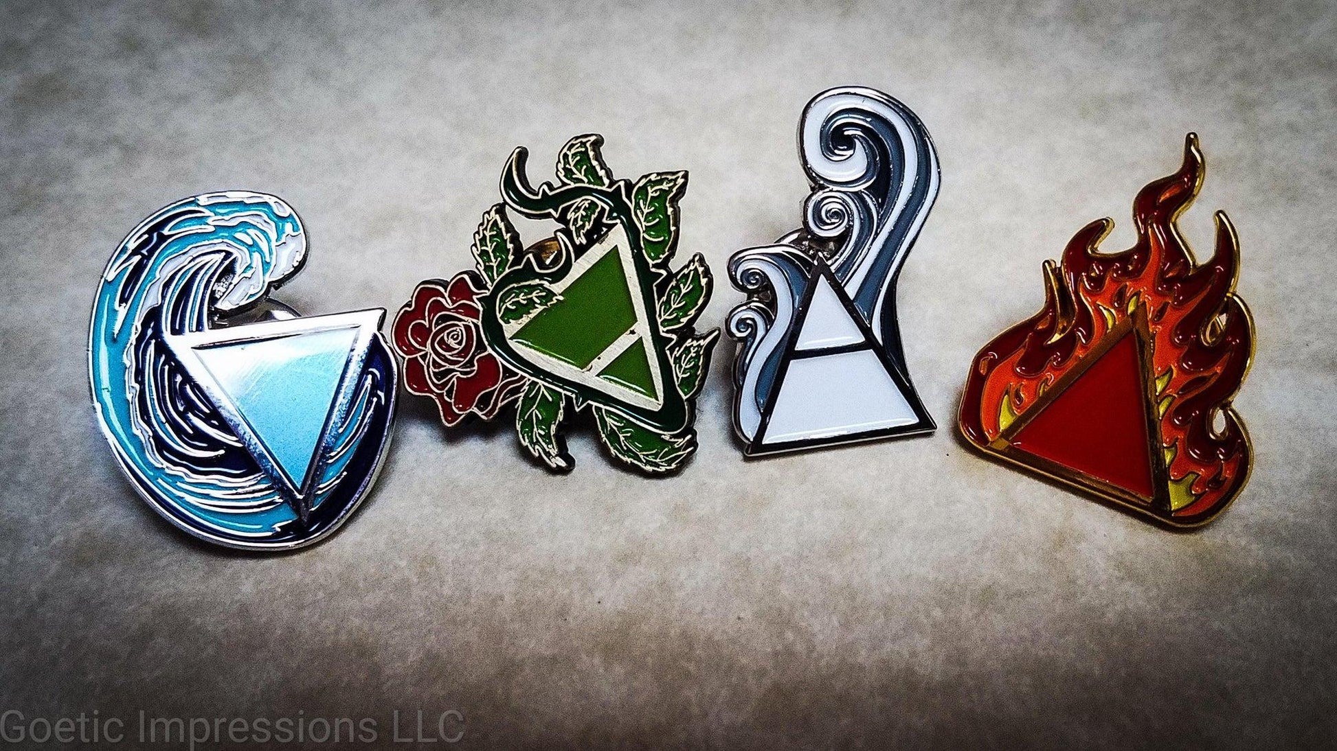 four alchemy symbols, air, fire, earth, water pins