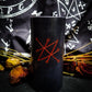 Black pillar candle featuring a red sigil of Saturn or Azazel.