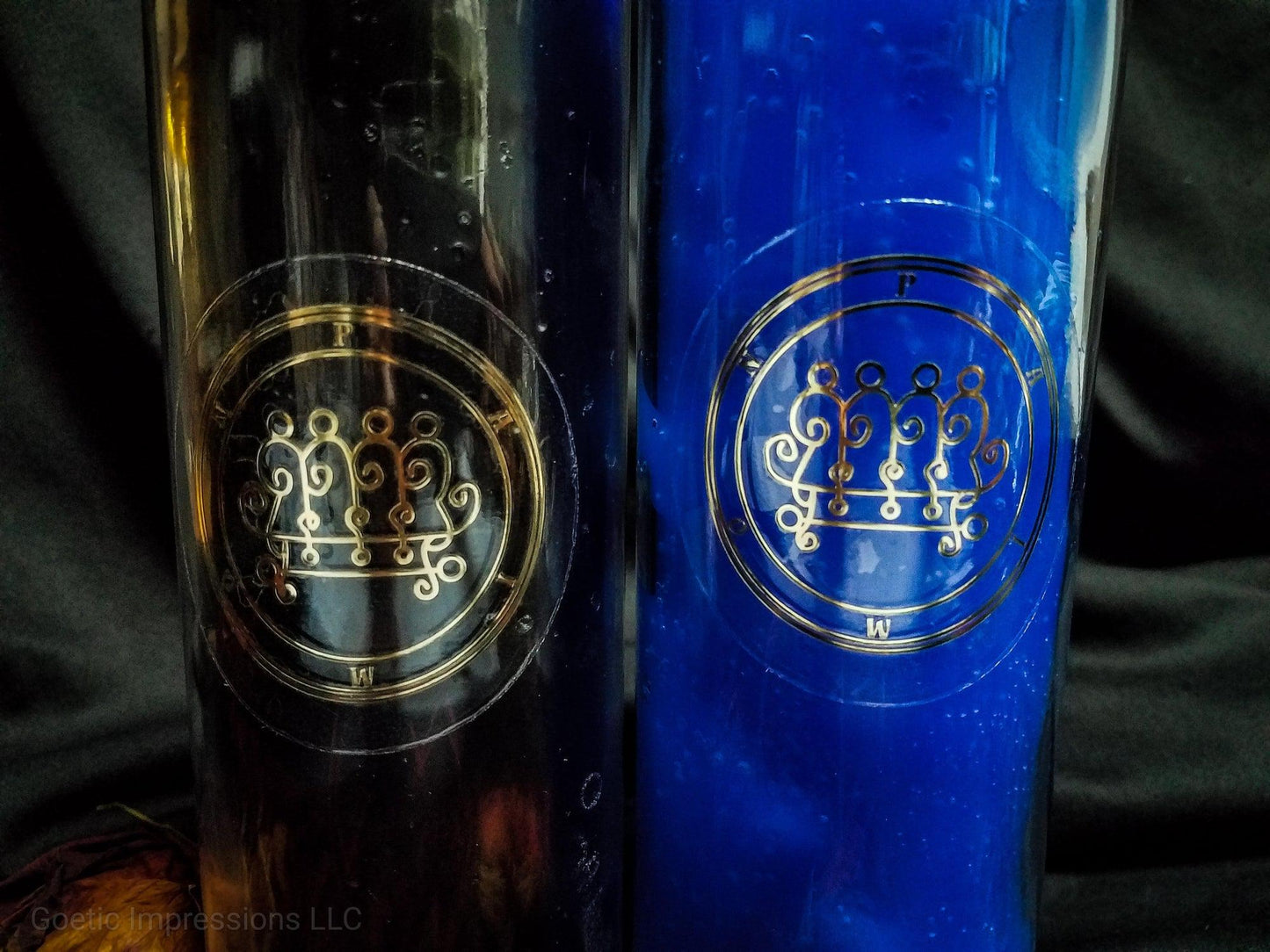 Gold Paimon sigil on black and blue 7 day candles