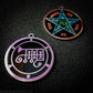 Two silver plated medallions featuring the front and back of the Ars Goetia spirit Ronove. The sigil is purple with the name and circle surrounding in purple. The Reverse is the TETRAGRAMMATON. The pentacle is blue with a red circle. Tetragrammaton is in red. The center sigil is green. 