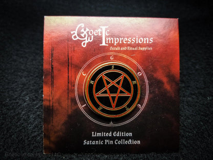 Satanic Pin featuring a black, red and gold Satan Pin