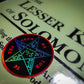 Colorful holographic sticker featuring the Pentacle of Solomon from the Lesser Key of Solomon