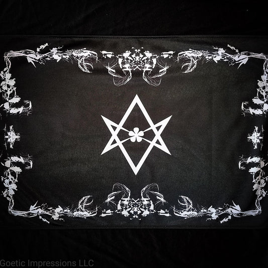 A black and white altar cloth with the Aleister Crowley Unicursal Hexagram from Thelema.