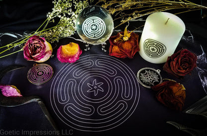 Hekate altar featuring altar cloth, crystal ball, candle and medallion